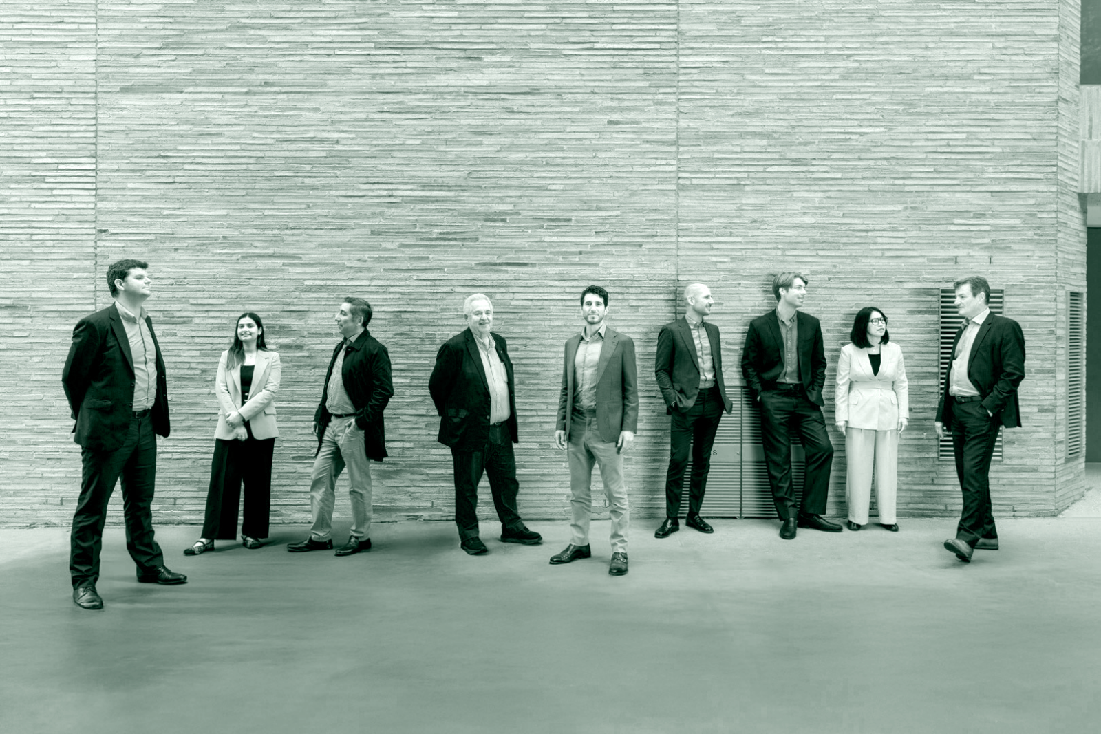 Jadig Finance team pictured with a green monochrome treatment.